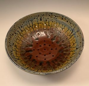 Jeanne Demers-red and ash glaze collander 10wx 3h