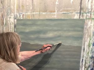 Margaret Lockwood Paints in her studio